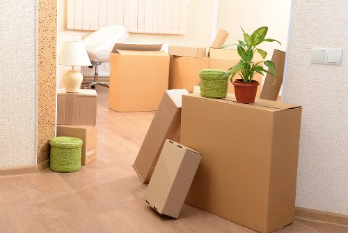 Careful handling of boxes and household items by a local moving team
