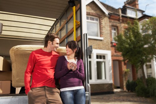 Packing and loading furniture into a removals van